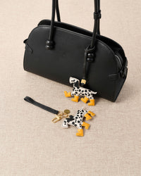 Handmade Dalmatian Rain Boots leather bag charm — French Alran goatskin from a tannery founded in 1903 in Tarn, France. STICKYZOO.