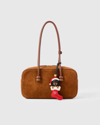 Handmade Santa Dachshund Stocking leather bag charm with 18K gold-plated keychain clip and engraved STICKYZOO gold tag — for keys, bags, and backpacks. French Alran goatskin.