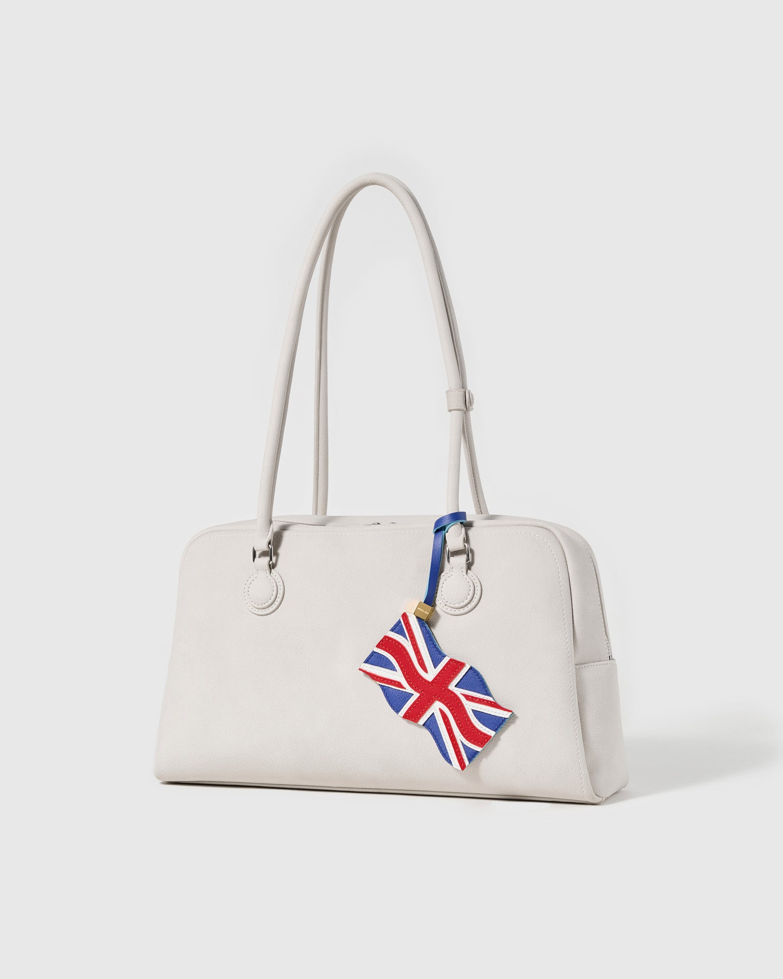Union Jack charm with gold keychain clasp, split ring, and engraved STICKYZOO coin