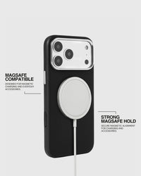 Black leather case holding a MagSafe charger with strong built-in magnetic alignment