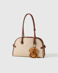 on bag — French Alran goatskin + alcantara suede, 72 hours by hand.