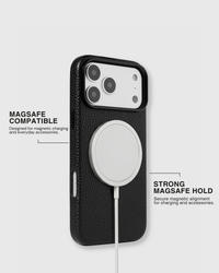 Textured black leather phone case with MagSafe charger magnetically attached showing strong alignment. Designed for magnetic charging and everyday accessories. Loved by Thousands.