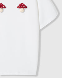 Side view of Mushroom T-Shirt in white showing sleeve and cotton fabric