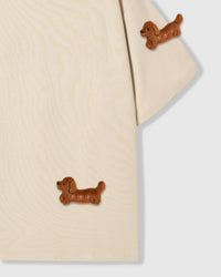 Detail view of hand-stitched dachshund showing individually sewn plush construction