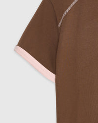Model wearing STICKYZOO Dachshund Bloom Ringer in brown showing dropped shoulders and boxy proportions
