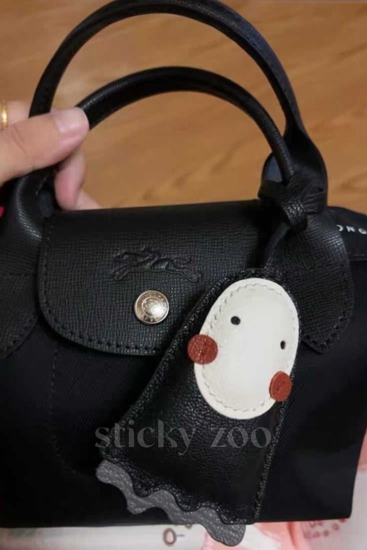 NO FACE CHARM