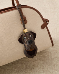 Labrador Retriever charm — 5,000+ reviews across STICKYZOO. Real French leather + suede, 3 days by hand.