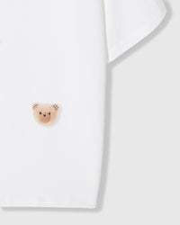 Close-up of single plush bear face on sleeve of Khaki Teddy Check-Ear T-Shirt