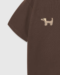 Detail of hand-stitched dachshund trio showing houndstooth pattern and plush construction