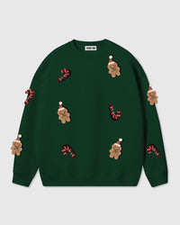 STICKYZOO Gingerbread Party Crashers Sweatshirt in forest green colorway with eleven hand-stitched plush gingerbread and candy cane appliques