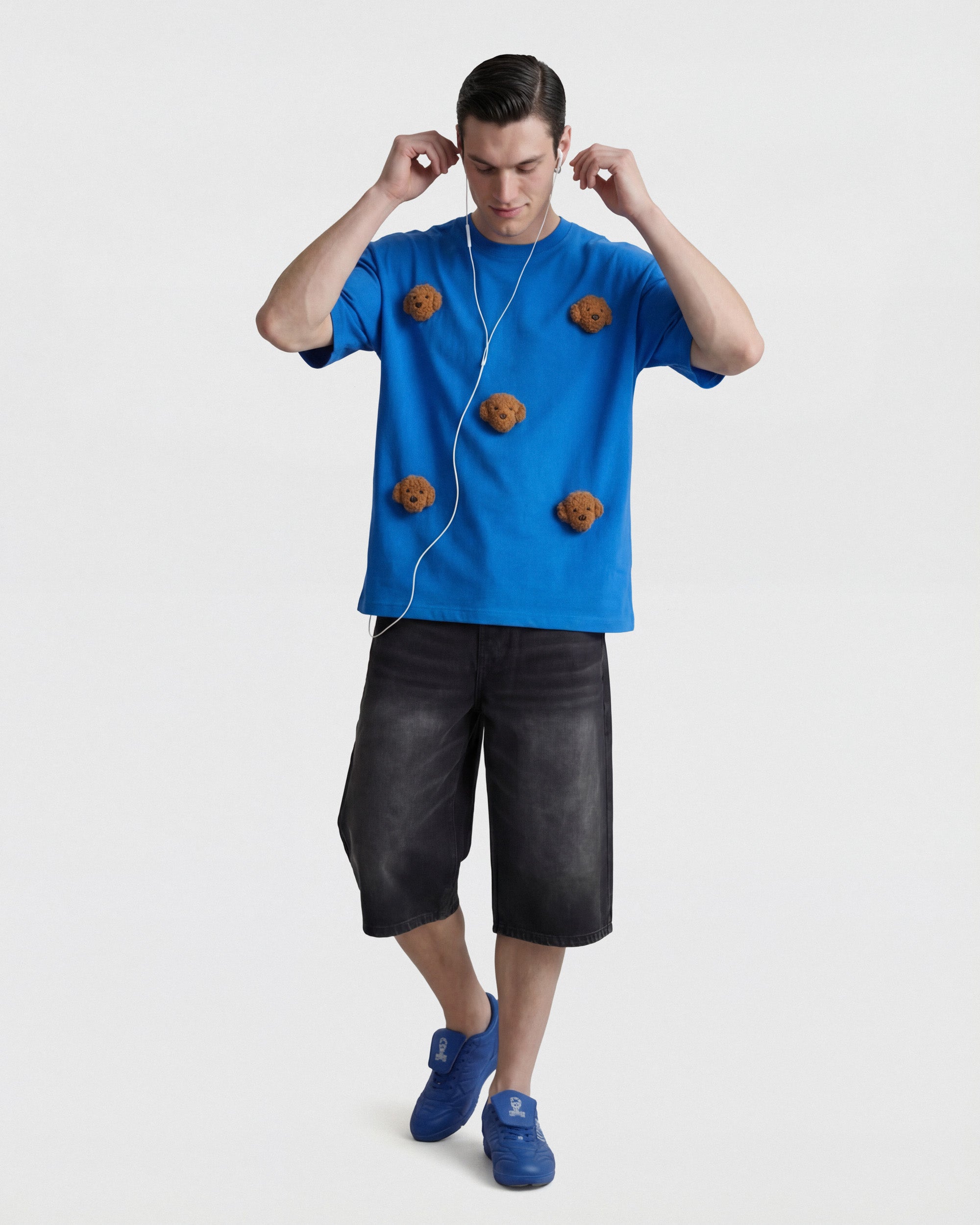 {{Rated 4.9 by thousands}} Model styling blue Poodle Parade T-Shirt with seven hand-stitched plush poodles