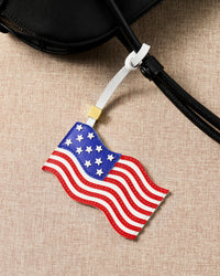 USA flag leather charm on black bag — handmade Stars and Stripes in French Alran goatskin by STICKYZOO