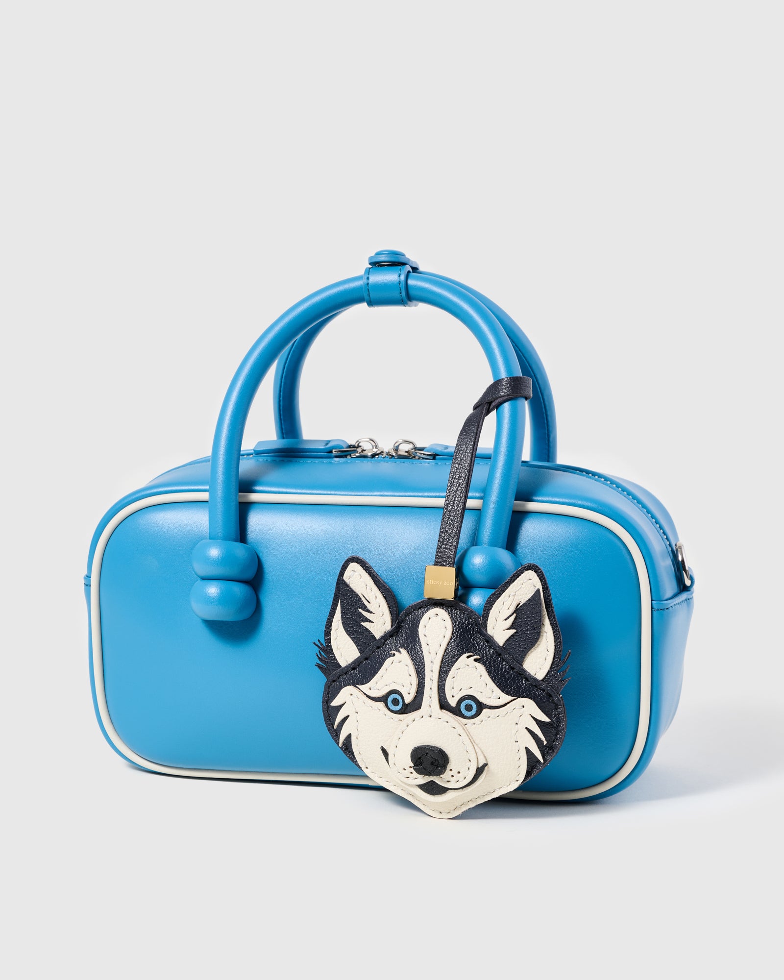 {{100,000+ sold worldwide}} Leather husky face charm on blue bag — handmade French Alran goatskin by STICKYZOO