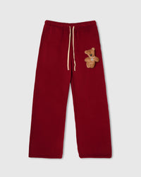 STICKYZOO TEDDY BEAR SWEATPANT in red featuring one hand-stitched plush teddy bear appliqué, designed in Amsterdam