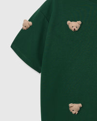 Detail of sleeve and body on STICKYZOO green Bear T-Shirt showing plush bear faces at different angles