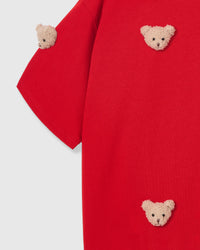 Back view of STICKYZOO red t-shirt showing clean boxy silhouette and double-stitched seams