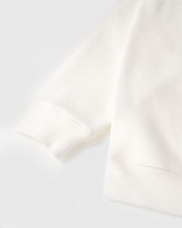 Back view of STICKYZOO white Teddy Bear Sweatshirt showing boxy silhouette and ribbed neckline