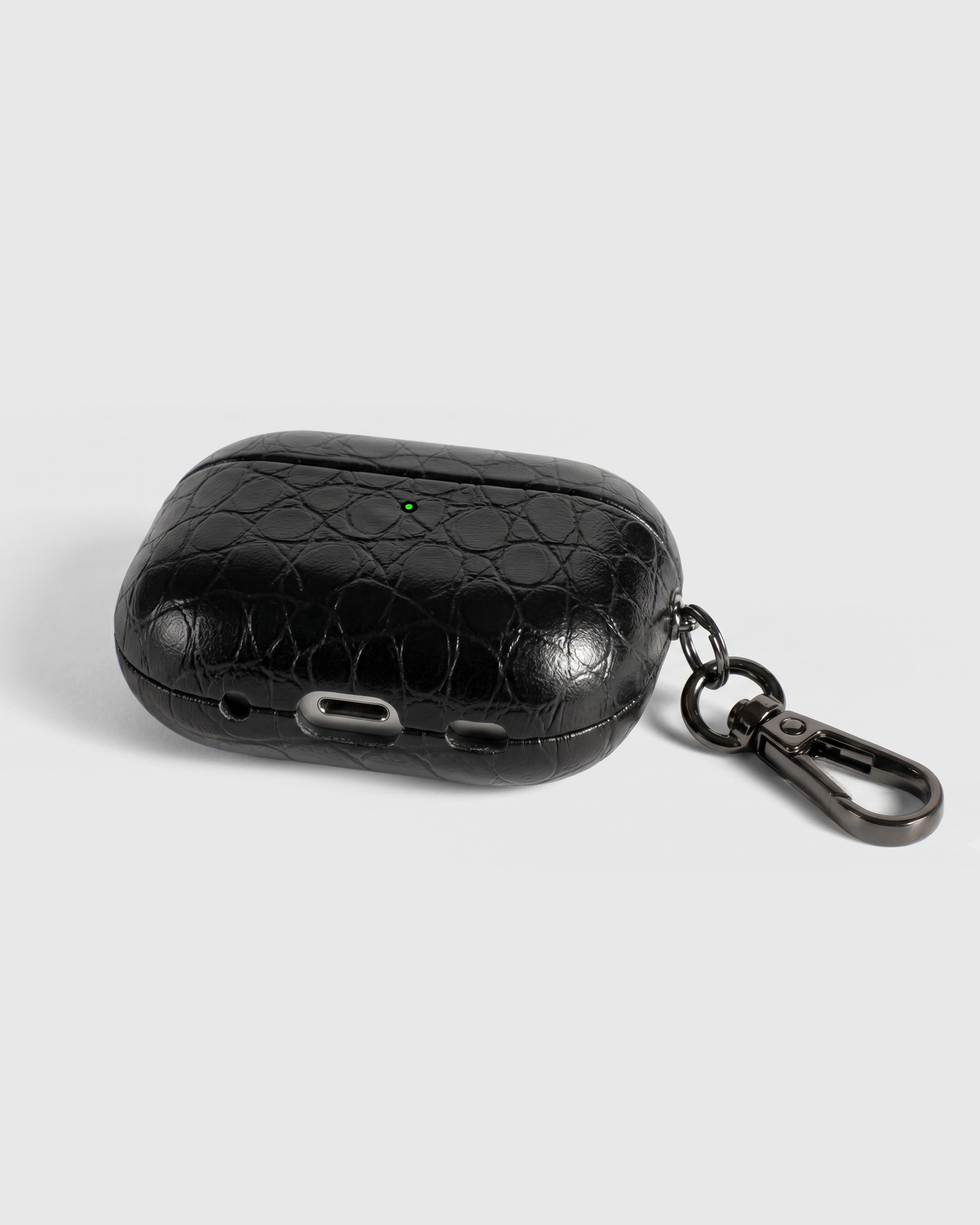 {{Rated 4.9 by thousands.}} Back view of black croc case showing USB-C port, speaker cutouts, and metal carabiner