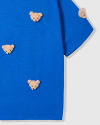 Back view of STICKYZOO blue t-shirt showing clean construction and ribbed neckline