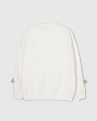 Back view of cream Teddy Check-Ear Sweatshirt showing clean silhouette with bear faces at cuffs