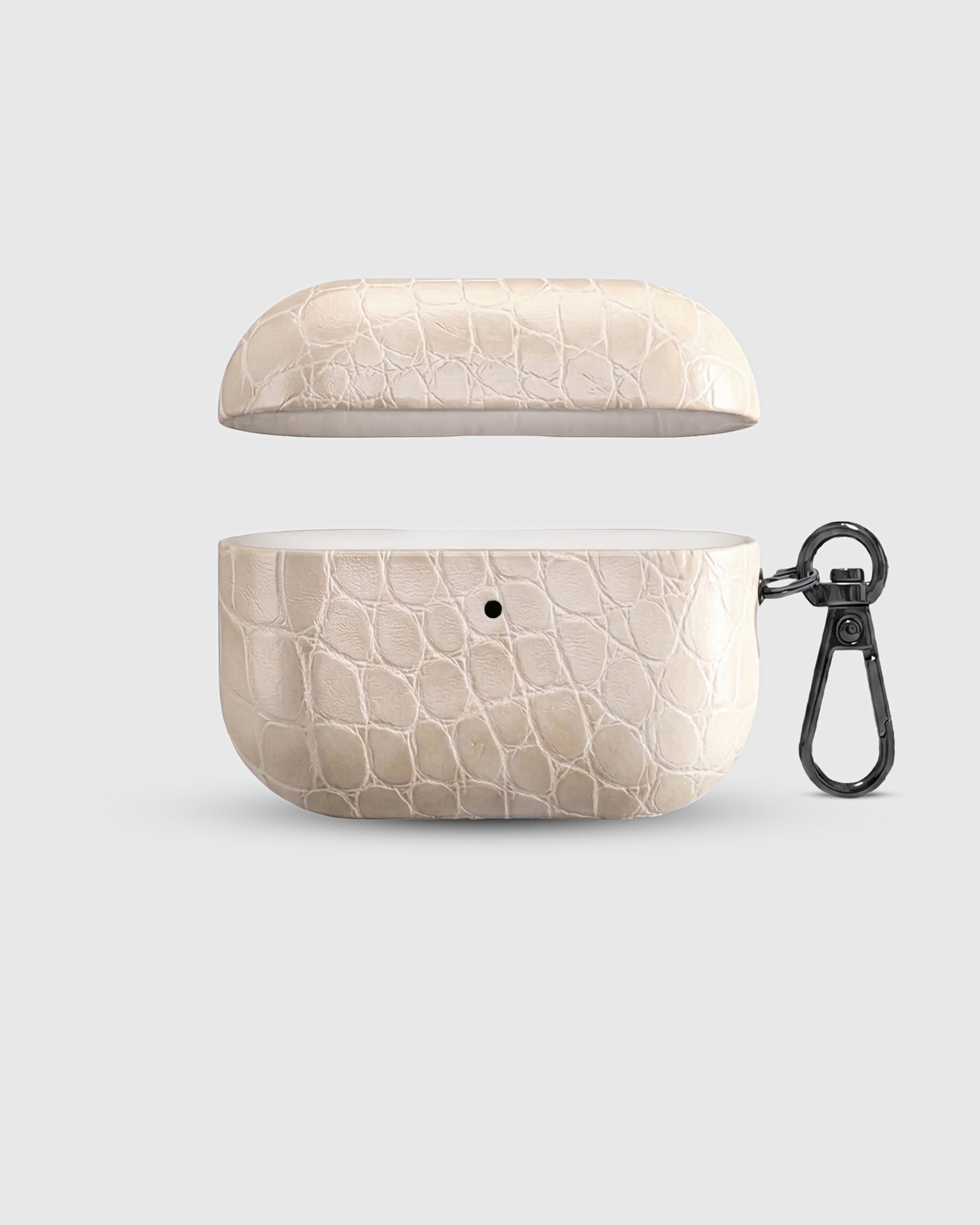 STICKYZOO ivory croc case open showing raised crocodile texture and polycarbonate interior