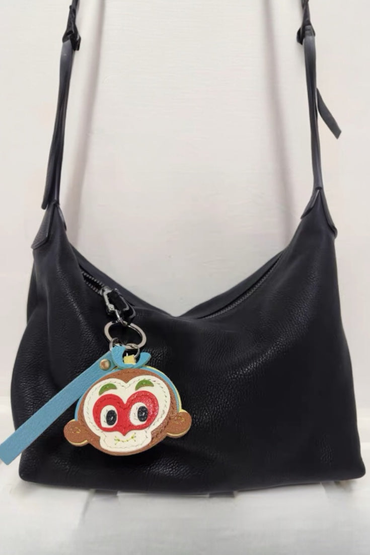 Bag with monkey charm online