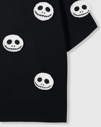 Model wearing Skull-Smiles Halloween T-Shirt showing dropped shoulders and skull placement