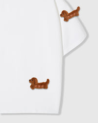 Detail of two plush dachshund appliques on white Dash Dachshund T-Shirt showing dimensional stitching