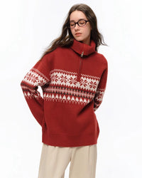 Back view of STICKYZOO Holiday Sweater showing continuous Fair Isle pattern across sleeves and clean ribbed finishing