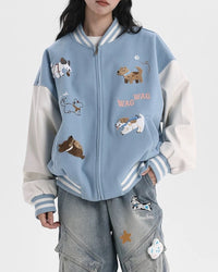 Model wearing STICKYZOO Wag Wag Puppy Jacket showing oversized varsity proportions and contrast sleeves
