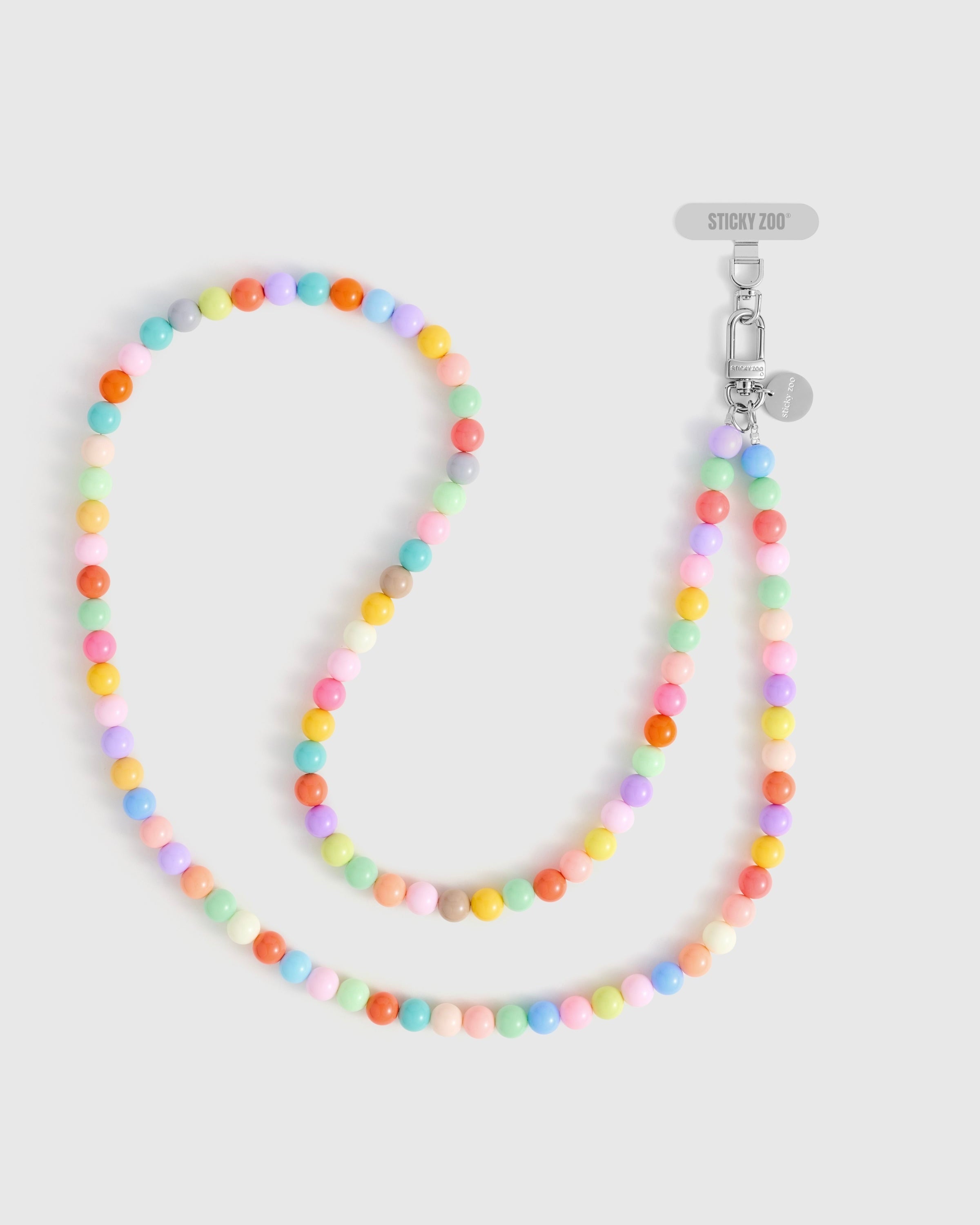 Gelato Orbit: handmade beaded phone strap by STICKYZOO in a soft pastel colorway, worn cross-body or wound around the wrist