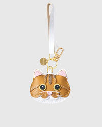 Orange tabby on an 18K gold-plated keychain clip with engraved STICKYZOO disc — clips to keys, bags or backpacks.