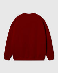 Back view of red Gingerbread Joy Sweatshirt showing oversized boxy proportions and clean seams