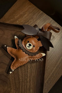 BALLET BEAR CHARM on an 18K gold-plated keychain clip with engraved STICKYZOO disc — clips to keys, bags or backpacks.