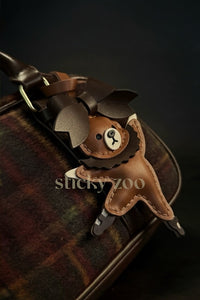 BALLET BEAR CHARM charm styled on a bag — a small, specific piece that turns a simple bag into a personal one.