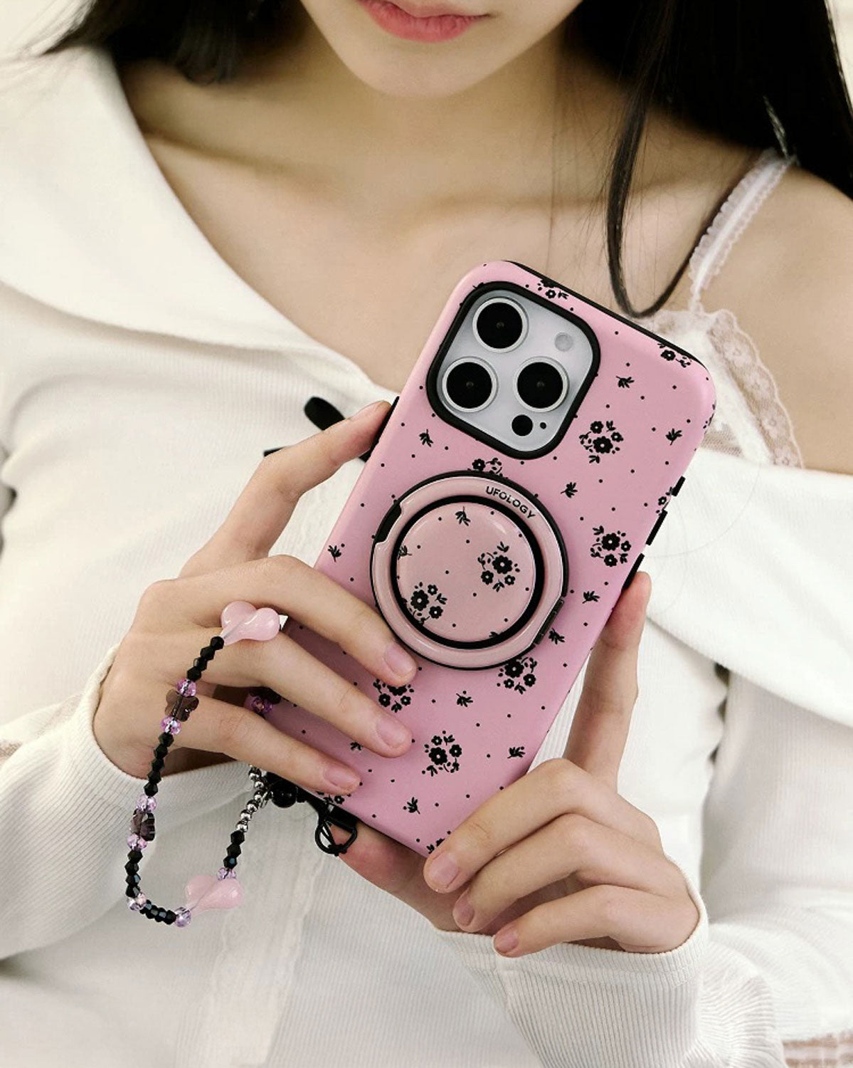 Custodia per telefono rosa con piccolo motivo floreale