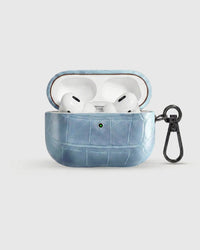 Ice Blue Croc case open with AirPods Pro seated inside, croc-embossed lid visible