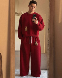 Model wearing STICKYZOO Saint Teddy Bear matching set in red showing full set styling