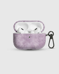 Lavender Croc case open with AirPods Pro seated inside, croc-embossed lid visible