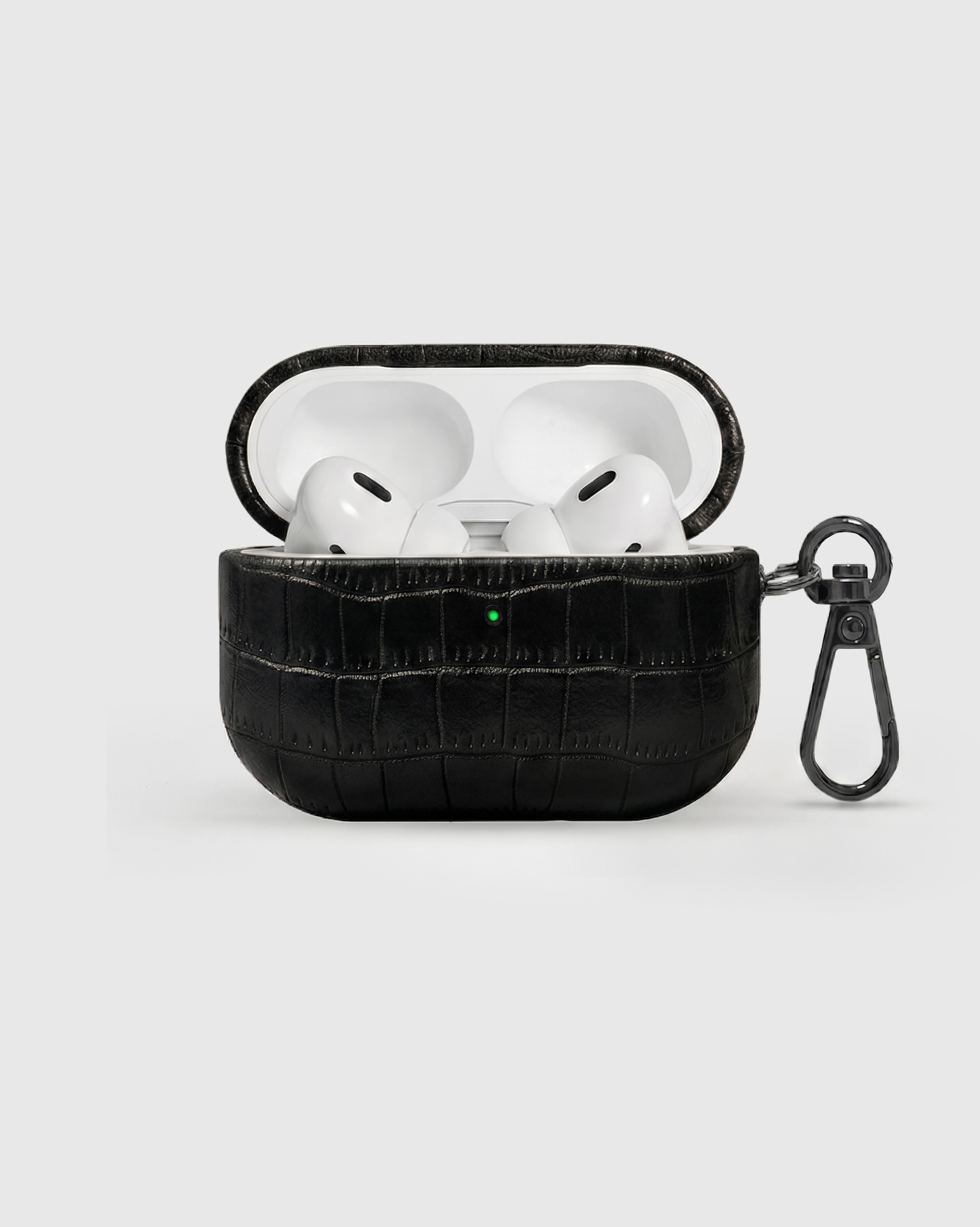 {{AirPods Pro fit securely.}} Black vintage croc case open with AirPods Pro seated inside