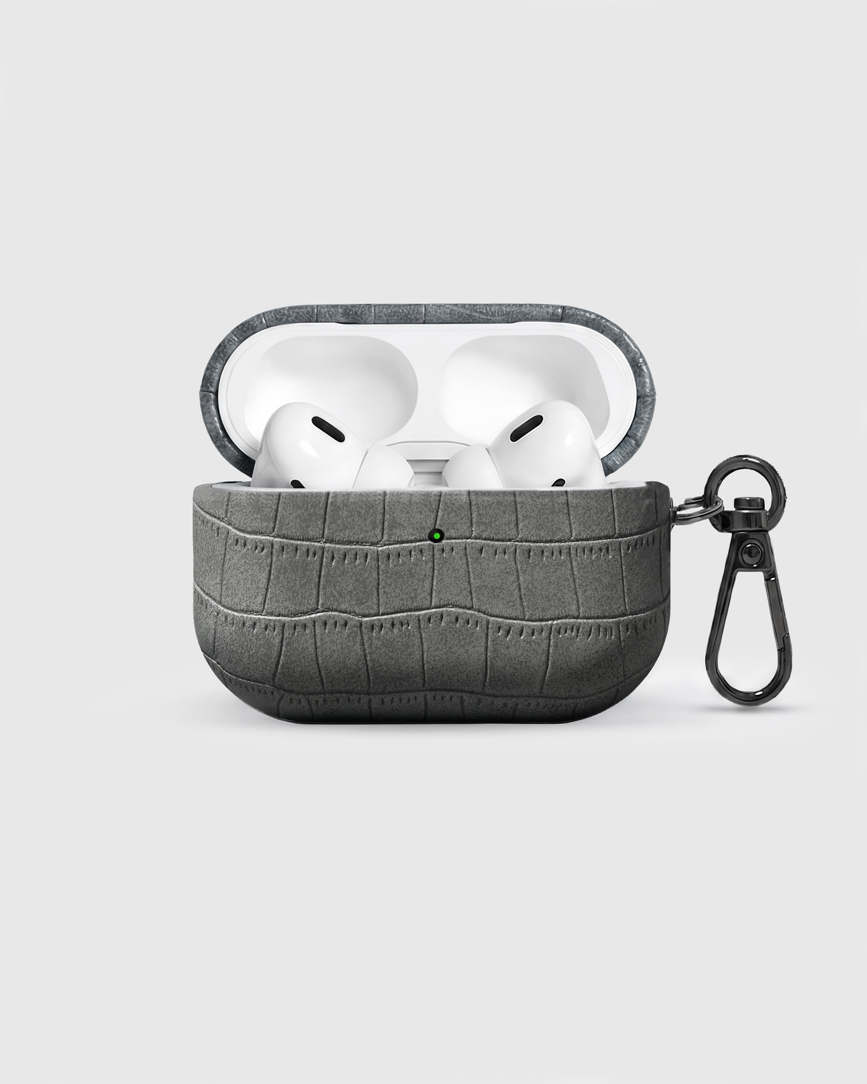 {{AirPods Pro fit securely.}} Slate vintage croc case open with AirPods Pro seated inside