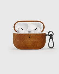 Cognac vintage croc case open with AirPods Pro seated inside