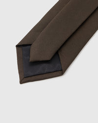 STICKYZOO ESPRESSO TEXTURE TIE back detail showing structured interlining and hand-finished slip stitching, 145 × 8 cm