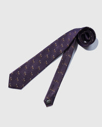 Hand-finished interior Pointer Tie Plum back view showing structured interlining and tipping on plum silk with pointer motifs